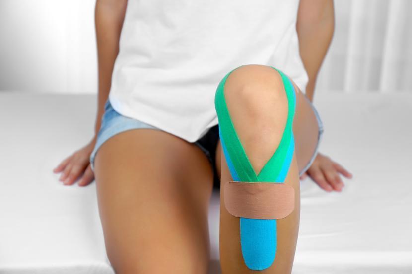 how does kinesiology tape work